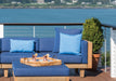 Lloyd Flanders square and lumbar throw pillows on a Catalina sectional by the water