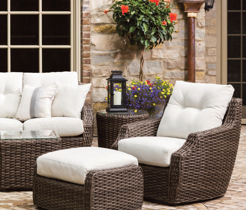 Lloyd Flanders white throw pillows on Largo wicker seating