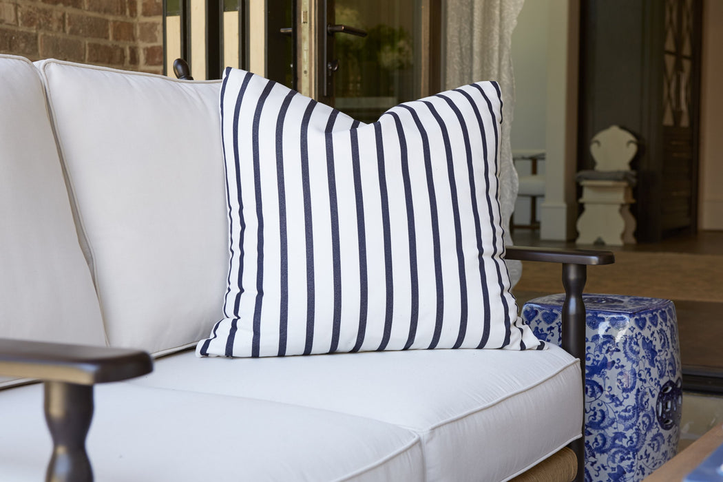 Navy stripe Lloyd Flanders throw pillow on a Low Country loveseat
