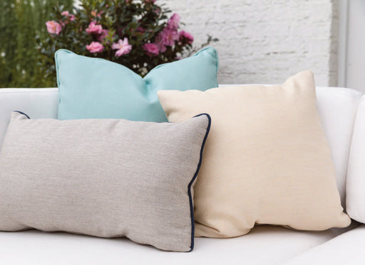 Lloyd Flanders throw pillows: square pillows and a lumbar pillow with a contrast welt