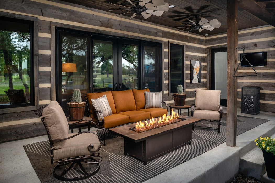 OW Lee Classico 3-Piece Seating Set on a covered porch with a fire table