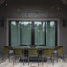 Lloyd Flanders Escape dining set on a patio