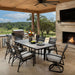 OW Lee Arc dining set on a patio