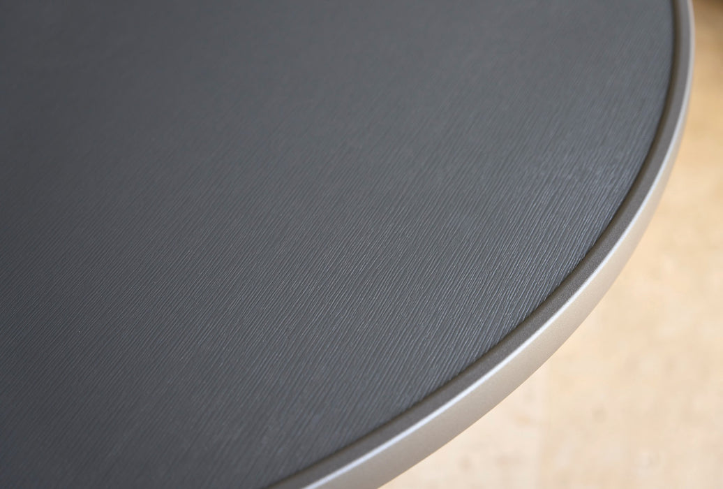 Telescope Casual Cascade MGP banded tabletop close-up: long-stroke textured marine grade polymer with a powder-coated aluminum band