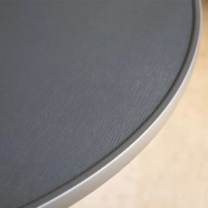 Telescope Casual Cascade tabletop close-up showing the textured finish and banded edge