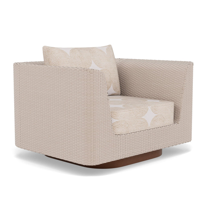 Woodard Mingle Swivel Lounge Chair, shown in a Woodard outdoor setting (some pieces shown are sold separately)