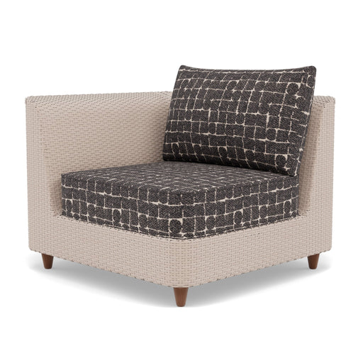 Woodard Mingle Corner Lounge Chair, shown in a Woodard outdoor setting (some pieces shown are sold separately)