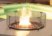 Homecrest 22.5" round glass guard in use on a fire table