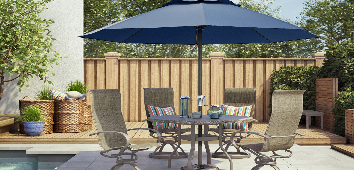 Homecrest Shadow Rock round dining table with an umbrella