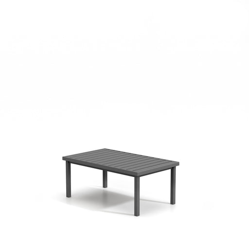 Homecrest Latitude 26" x 43.5" Rectangular Coffee Table, post base, studio view