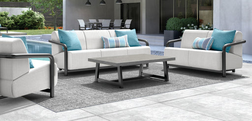 Homecrest Luxury Woven Vinyl outdoor rug under a seating group