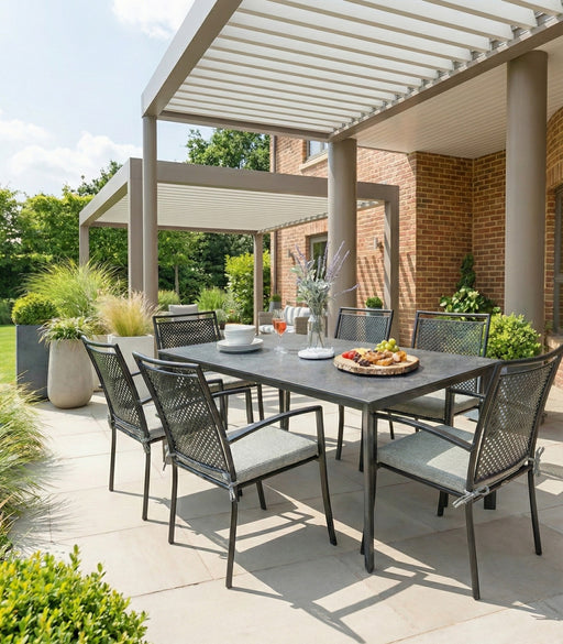 Kettler Reno 7-Piece Dining Set with Umbrella Hole under a pergola (seat pads shown not included)