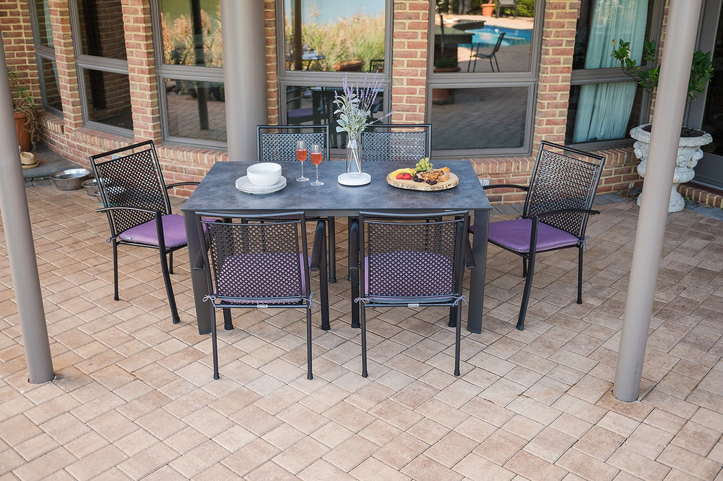 Kettler Reno 7-Piece Dining Set with Umbrella Hole on a brick patio (seat pads shown not included)