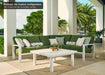 Telescope Casual Larssen sectional on a covered patio, pictured in the 4-piece configuration with an armless section