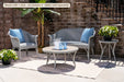 Lloyd Flanders All Seasons 3-Piece Padded Seating Set on a patio (Shown with 1 chair · set includes 2 · tables sold separately)