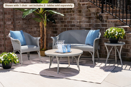 Lloyd Flanders All Seasons 3-Piece Padded Seating Set on a patio (Shown with 1 chair · set includes 2 · tables sold separately)