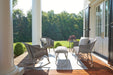 Lloyd Flanders All Seasons padded lounge seating in Pewter on a porch