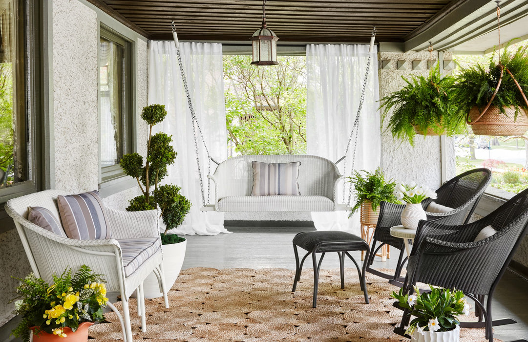 Lloyd Flanders All Seasons porch setting with settee swing, settee and rockers