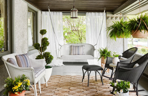 Lloyd Flanders All Seasons porch setting with settee swing, settee and rockers