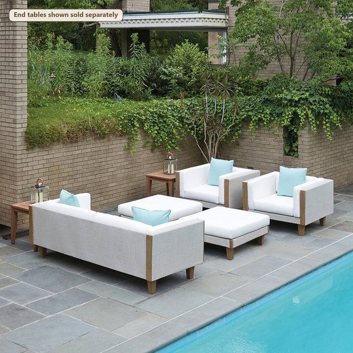 Lloyd Flanders Catalina 5-Piece Lounge Set with Ottomans on a patio (End tables shown sold separately)