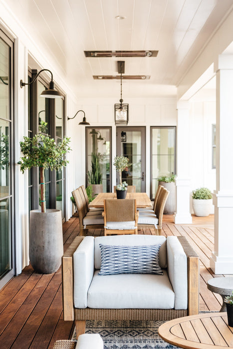 Lloyd Flanders Catalina lounge chair in Hickory on a covered porch