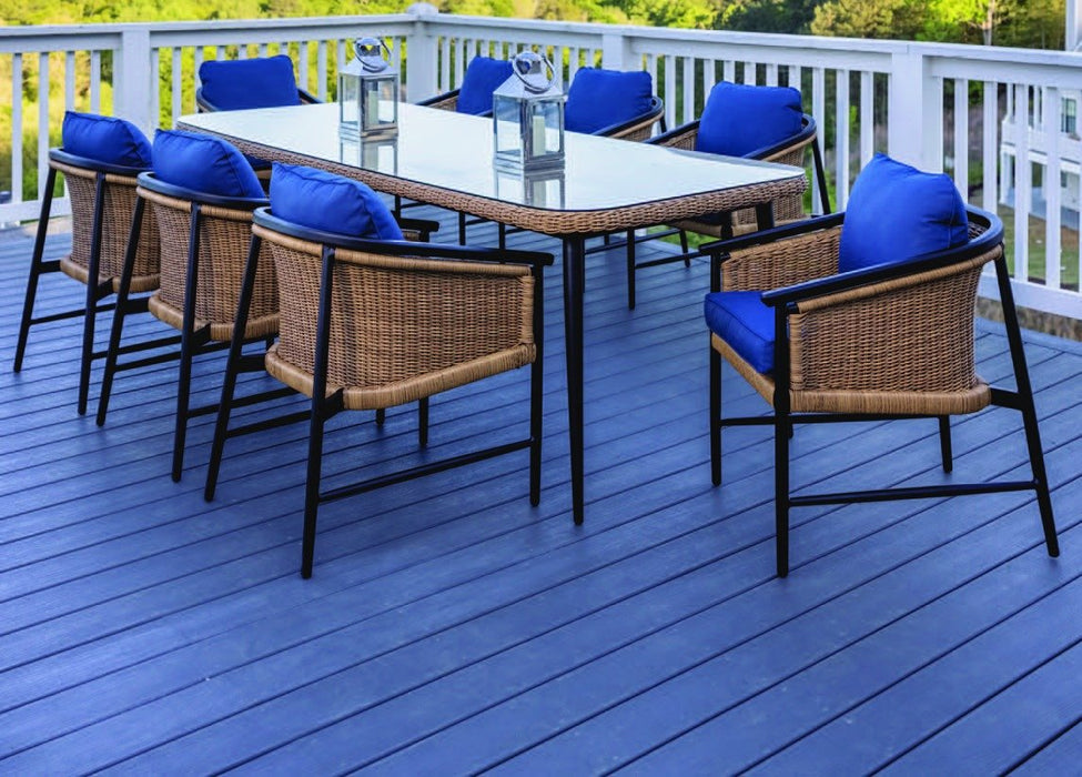 Lloyd Flanders Galloway 9-piece dining set: eight dining armchairs around the 95" glass-top table on a deck