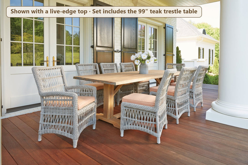 Lloyd Flanders Mackinac 9-piece teak dining set on a stone patio (shown with an earlier live-edge top)