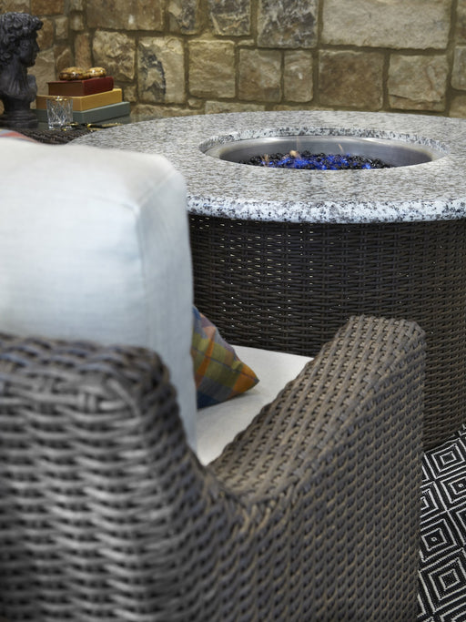 Lloyd Flanders Mesa 48 inch round fire table with granite top, lit