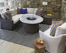 Lloyd Flanders Mesa L-shape sectional with the Mesa round fire table