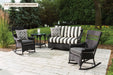 Lloyd Flanders Nantucket 3-Piece Glider Porch Set on a patio (End table shown sold separately)