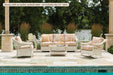 Lloyd Flanders Nantucket 4-piece seating set with lounge rocker by a pool (shown with an earlier cocktail table)