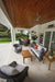 Lloyd Flanders Reflections seating in Pewter on a covered patio