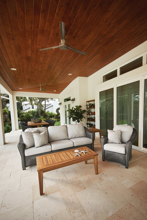 Lloyd Flanders Reflections sofa and lounge chairs in Pewter on a covered patio