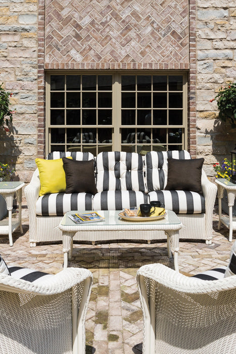 Lloyd Flanders Reflections sofa and lounge chairs in Ivory