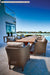 Lloyd Flanders Visions 7-Piece Teak Dining Set on a patio (Shown with 8 chairs and a similar table · set includes 6 chairs)