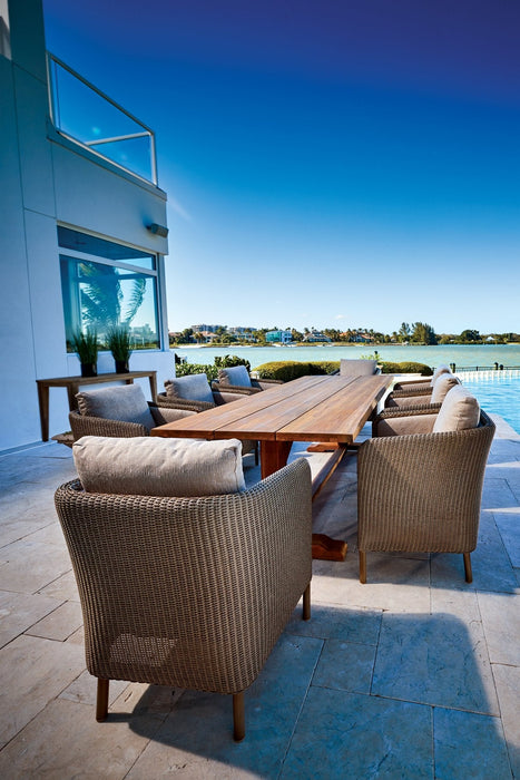 Visions Dining Armchair on a patio