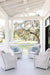 Lloyd Flanders Weekend Retreat lounge chairs in White on a porch