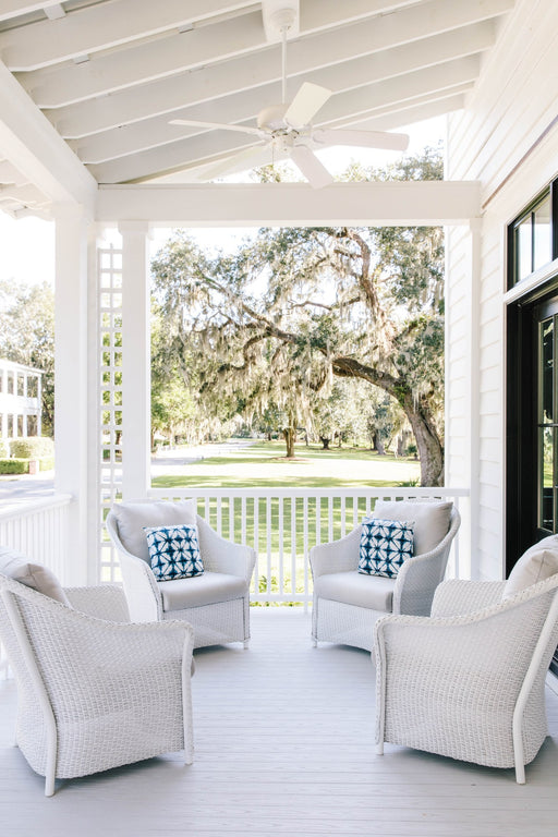 Lloyd Flanders Weekend Retreat lounge chairs in White on a porch