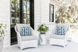 Lloyd Flanders Weekend Retreat lounge chairs in White on a porch