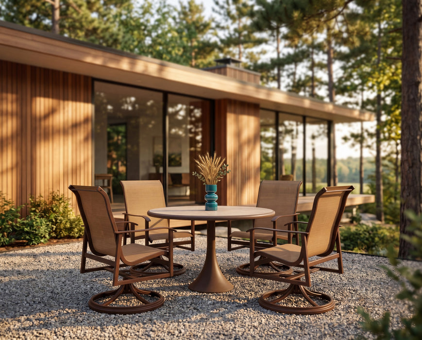 Woodard Louie pieces in an outdoor setting (some pieces shown are sold separately)
