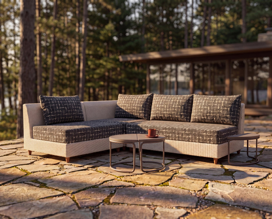 Woodard Mingle Armless Lounge Chair, shown in a Woodard outdoor setting (some pieces shown are sold separately)