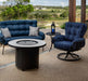 OW Lee Monterra sofa and swivel rocker around a fire table overlooking the hills (fire table and side table sold separately)