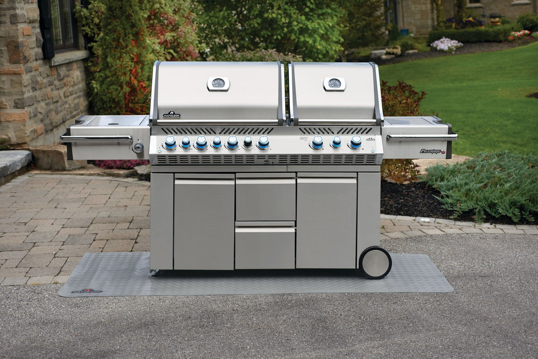 Napoleon large grill mat under a Prestige PRO 825 on a patio
