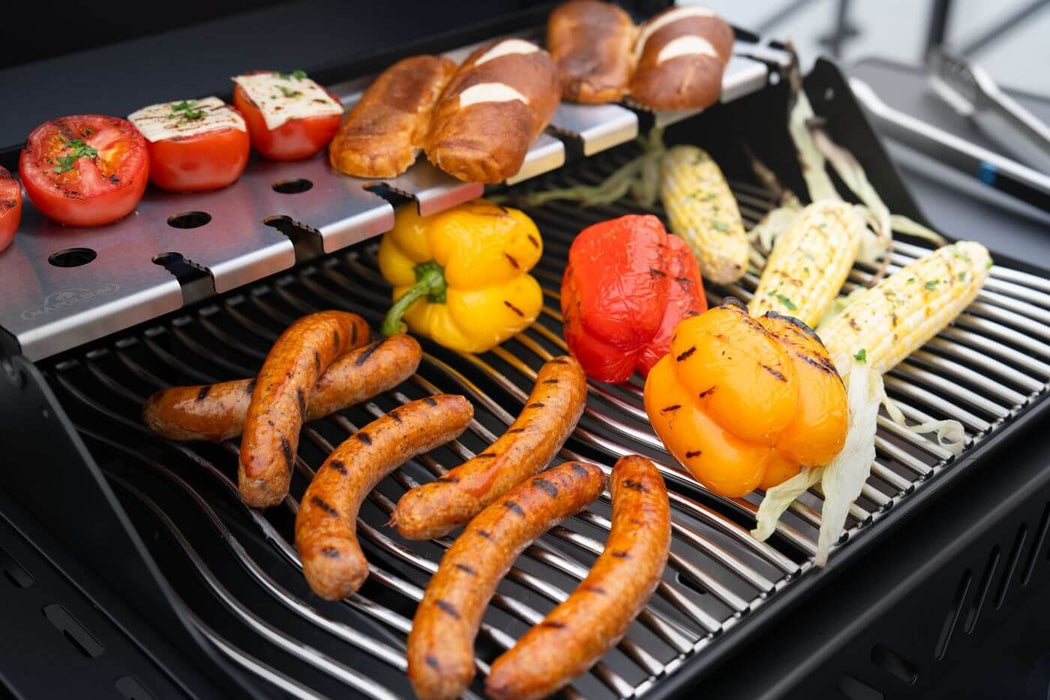 Sausages, peppers and corn on the Rogue PRO-S stainless Wave grids