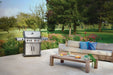 Rogue PRO-S 525 on a garden patio beside an outdoor sofa