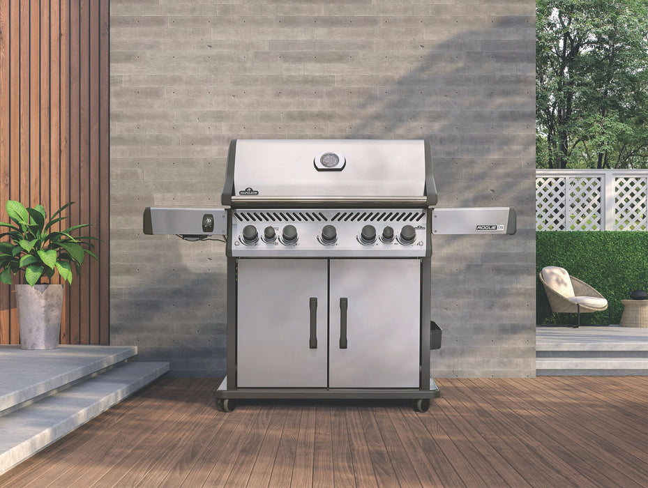 Rogue PRO-S 625 on a wood deck beside a stone wall