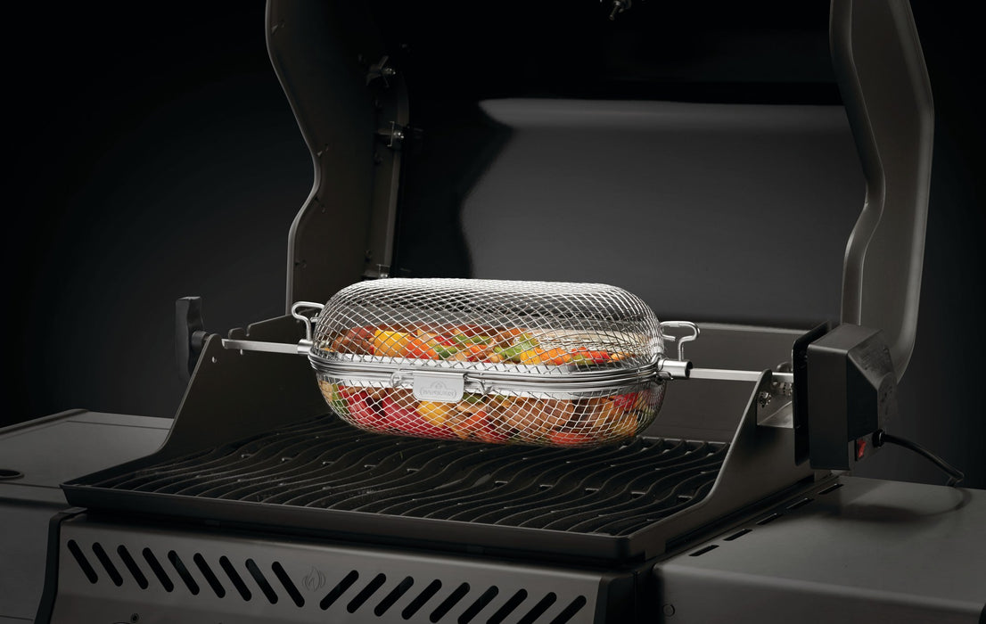 Napoleon rotisserie grill basket with vegetables turning on the rotisserie