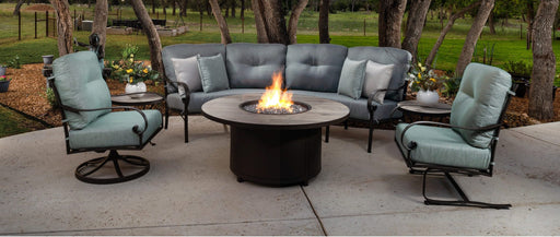 O.W. Lee Pasadera curved sectional, swivel rocker and spring base chair around a fire table