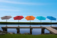 Panama Jack 9 ft crank umbrellas in gray, red, orange, teal and blue