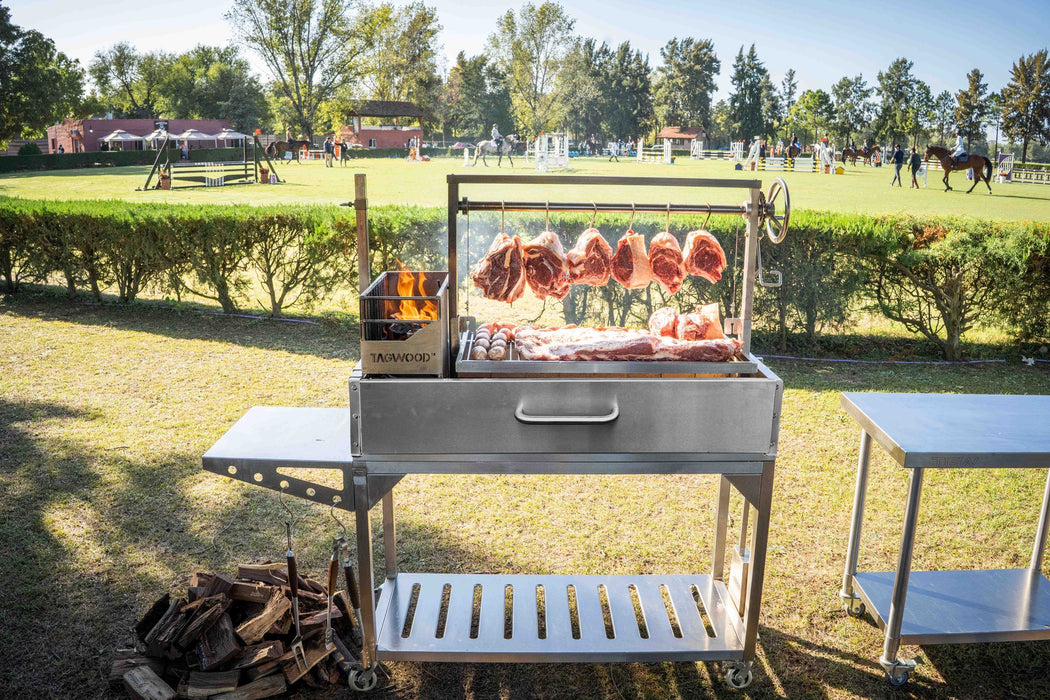Steaks and short ribs on a Tagwood BBQ03SS on a lawn